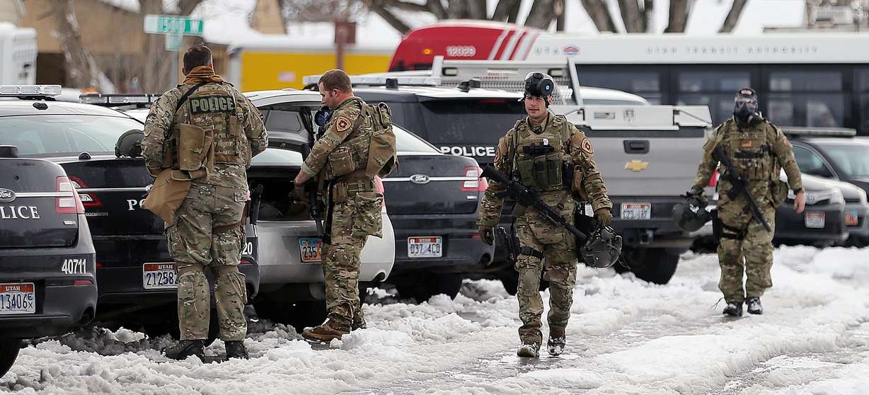 Salt Lake City Police SWAT team members download their gear after peacefully ending a barricaded individual situation in the area of 1450 W American Avenue on Sunday, March 4, 2018. (Photo: Scott G Winterton, KSL)