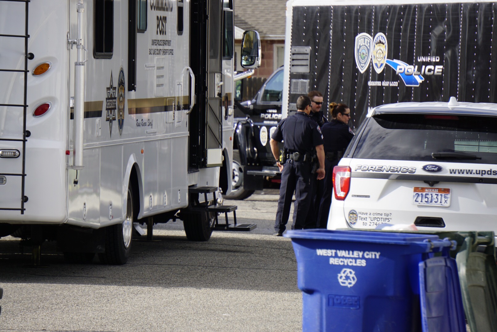 Investigators are photographed at the scene where a man, who was later identified as Elijah James Smith, 20, died after an officer-involved shooting near 3580 S. Jenelles Bay (2140 West) after police responded to a report of shots fired on April 8, 2018. (Photo: Steven Breinholt, KSL TV, File)