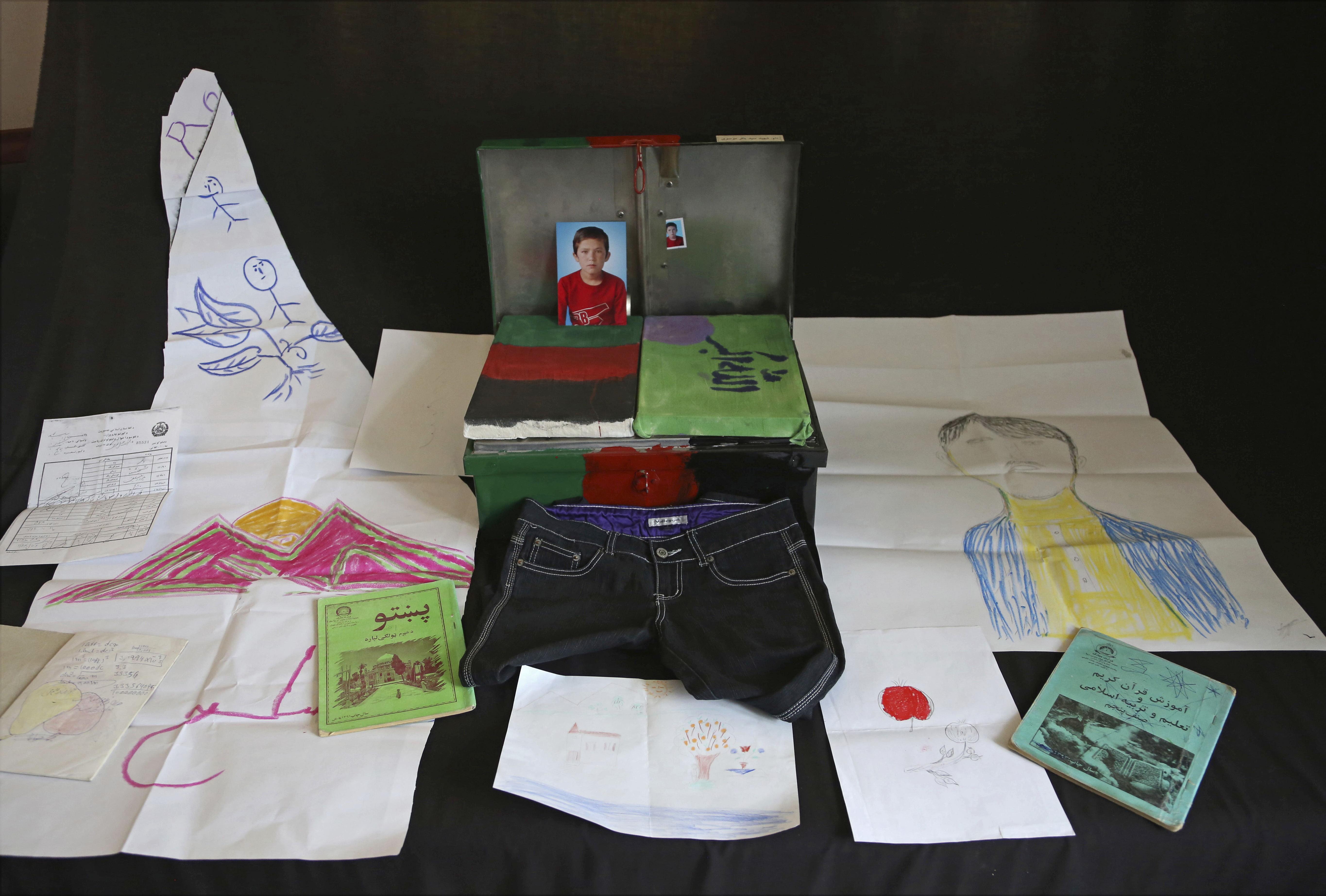 Memory boxes capture Afghans' pain of war, attempt to heal