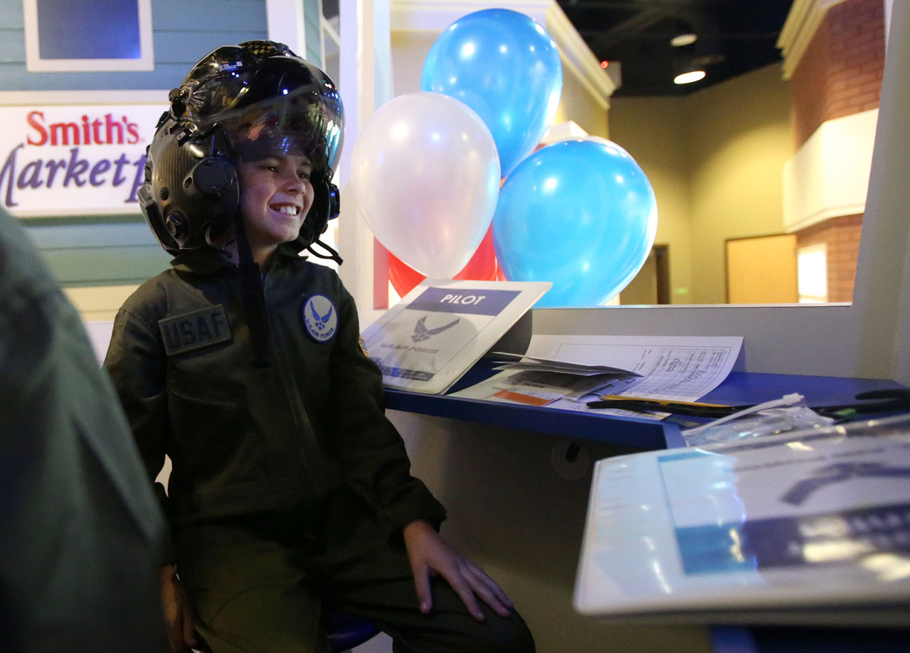 Seth Rushton wears an F-35 helmet in the new Hill Air Force Base air traffic control tower at Junior Achievement City at Discovery Gateway in Salt Lake City on Tuesday, April 10, 2018. (Photo: Kristin Murphy, KSL)