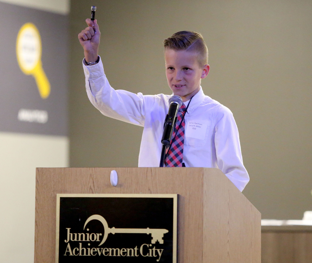 Carter Packham speaks as the CEO of Larry H. Miller in Junior Achievement City at Discovery Gateway in Salt Lake City on Tuesday, April 10, 2018. (Photo: Kristin Murphy, KSL)
