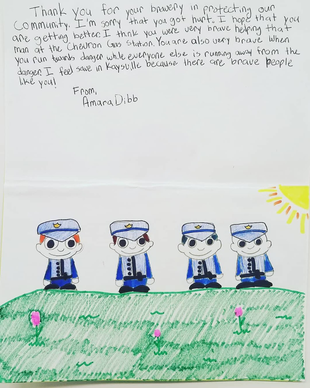 Amara Dibbs, a sixth-grader, drew this card for the Kaysville Police Department after hearing that several officers were injured when a man set himself on fire on Thursday, April 5, 2018. (Photo: Kaysville Police Department Facebook page)