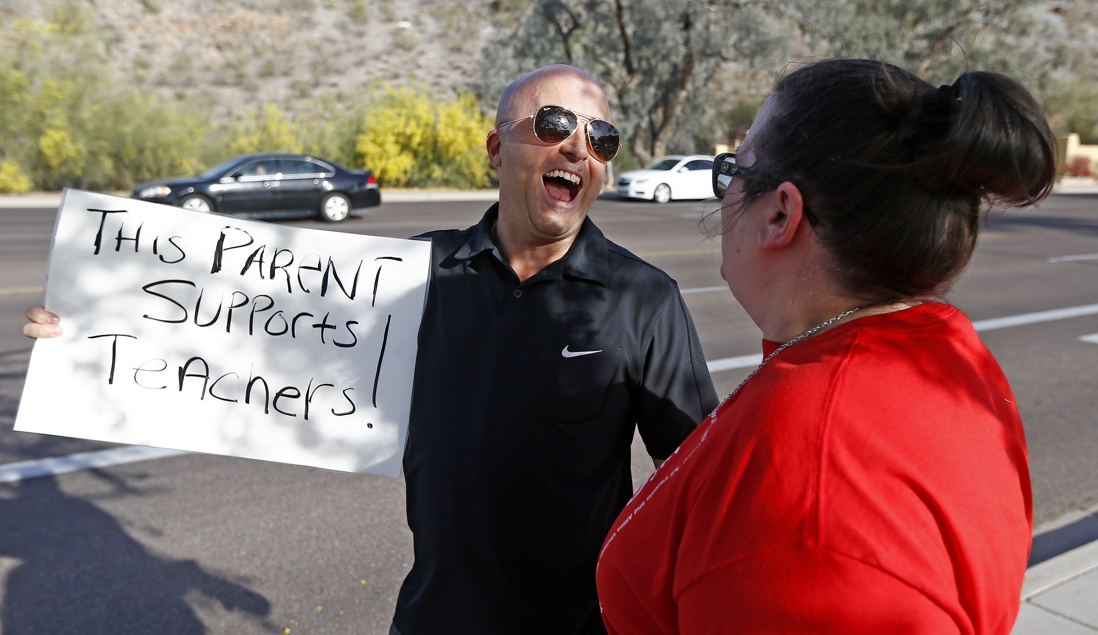 Arizona teachers demanding raise protest at schools