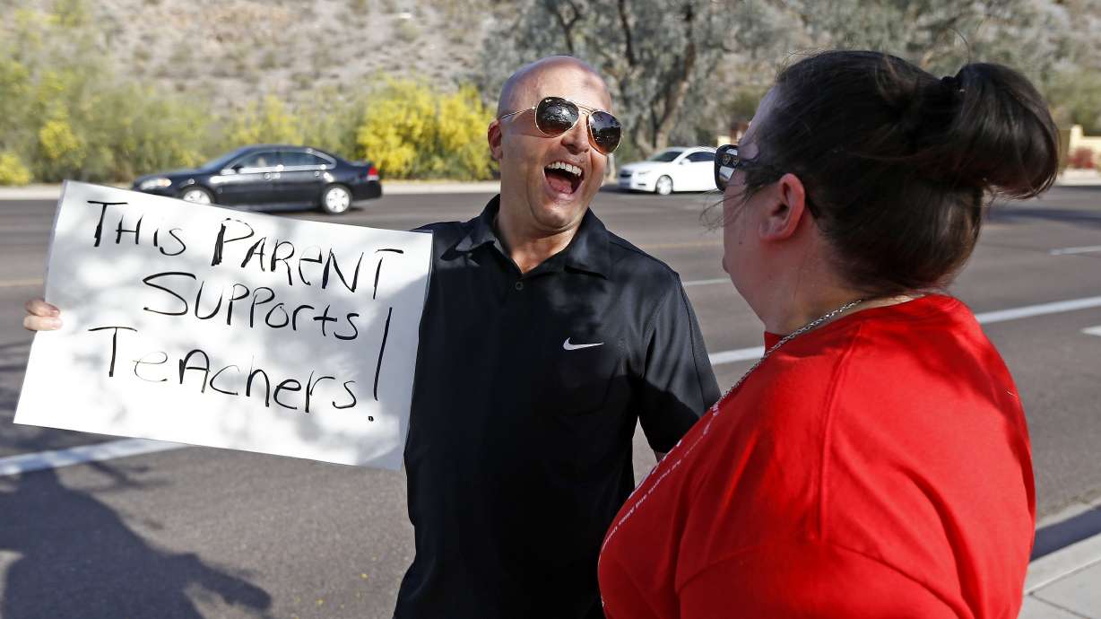 Arizona teachers demanding raise protest at schools