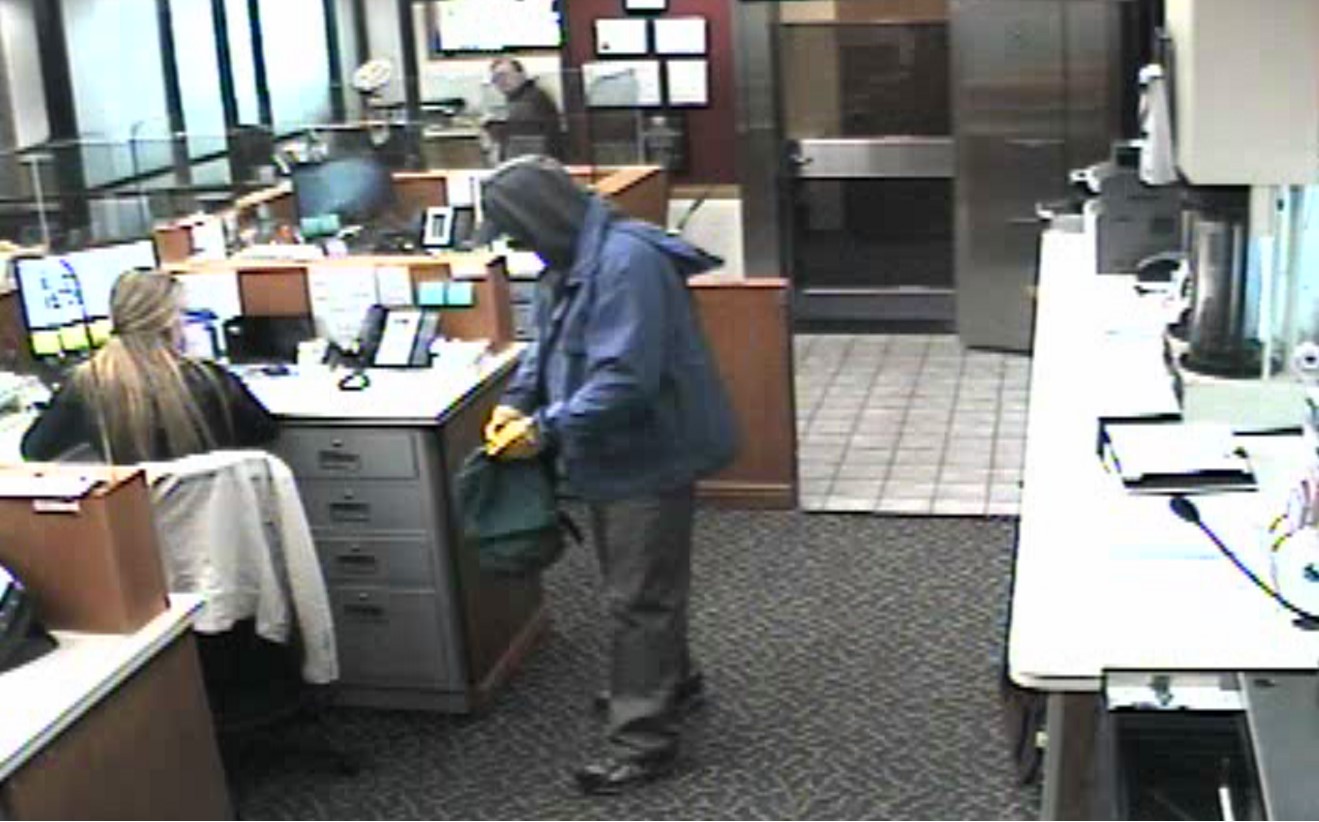 Surveillance video from First Utah Bank in Sandy. Police say a man entered the bank with a gun and demanded money about noon on March 22 before fleeing with an undisclosed amount of cash. (Photo: Sandy Police Department)