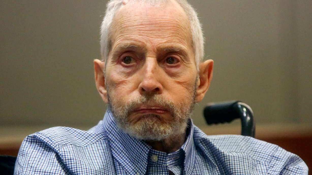 Robert Durst faces photos of slain friend in life, in death