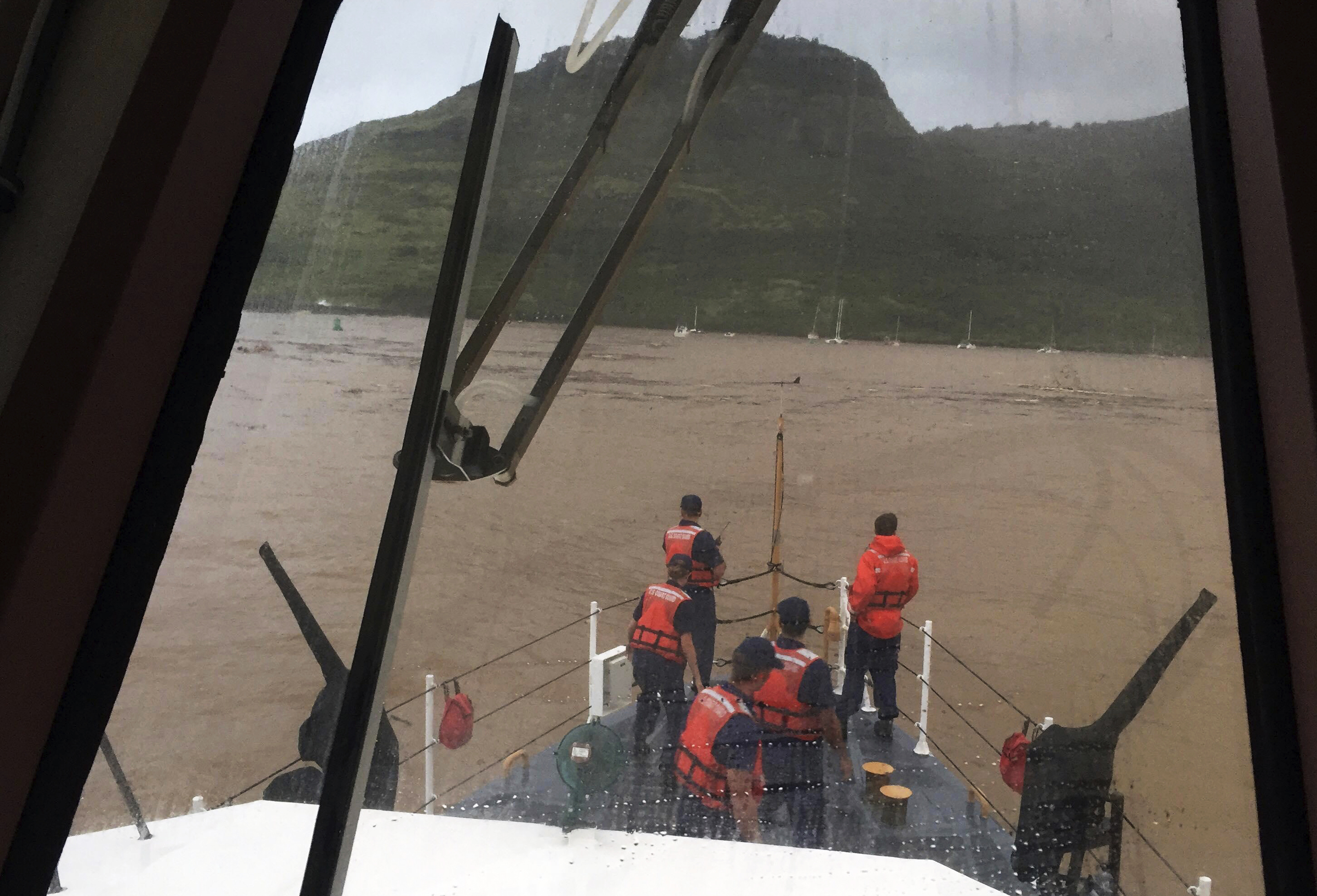 The Latest: More than 100 airlifted after storm hits Kauai