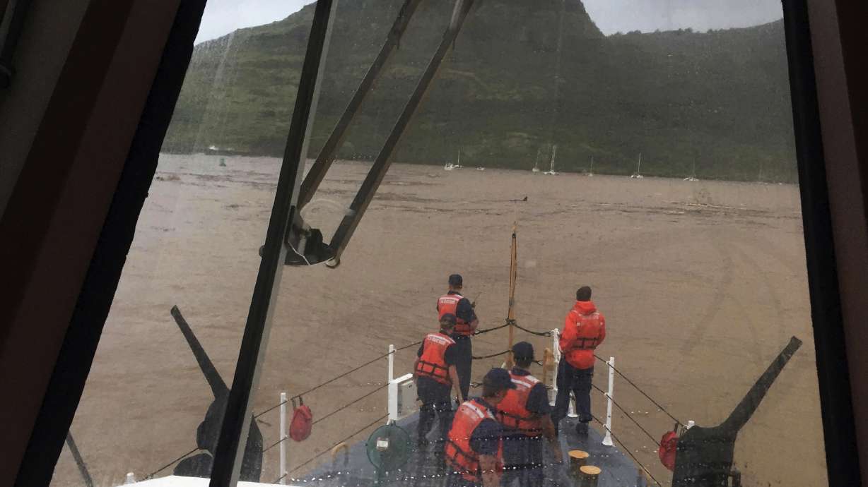 The Latest: More than 100 airlifted after storm hits Kauai