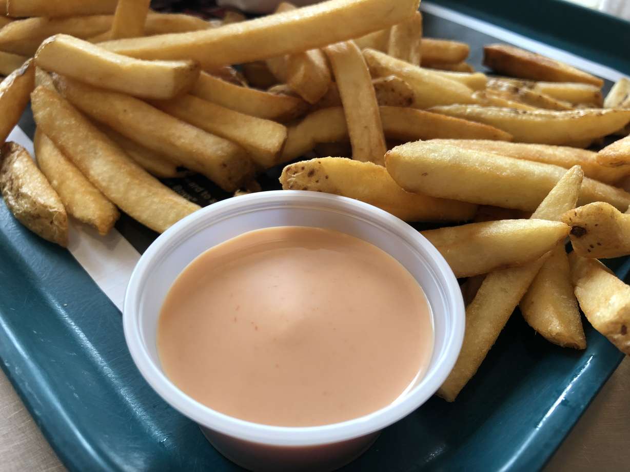 A photo of fry sauce next to fries on a tray at a restaurant. Fry sauce was an idea tossed around a few times for the new Utah flag during a recent public comment period, according to members of the Utah State Flag Task Force.