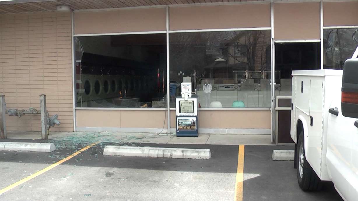 Gas-soaked clothes ignite blast at Logan laundromat