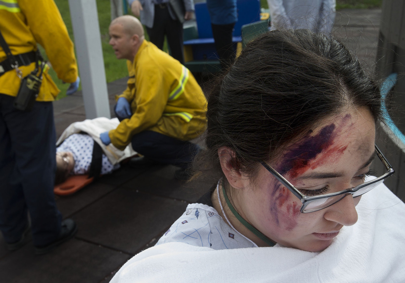 Stephanie Rosiles portrays a patient with a head injury and multiples fractures during a mock drill for the Great Utah ShakeOut at Shriners Hospitals for Children in Salt Lake City on Thursday, April 19, 2018. (Photo: Laura Seitz, KSL)