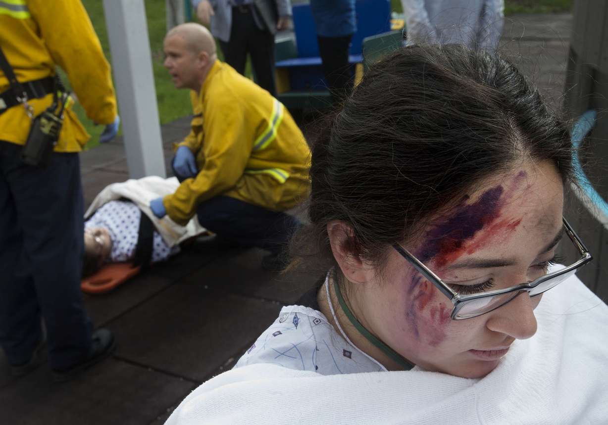 Stephanie Rosiles portrays a patient with a head injury and multiples fractures during a mock drill for the Great Utah ShakeOut at Shriners Hospitals for Children in Salt Lake City on Thursday, April 19, 2018. (Photo: Laura Seitz, KSL)