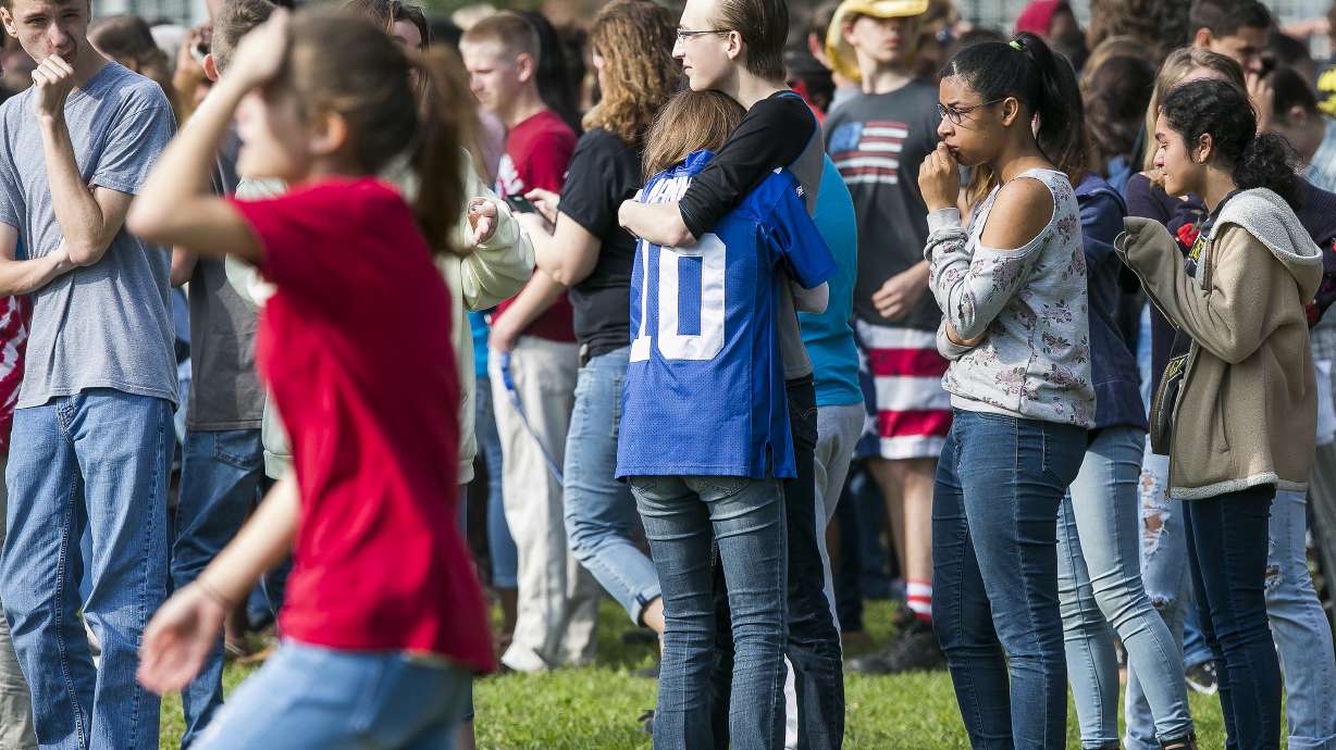 The Latest: Florida school shooting suspect says 'Sorry'