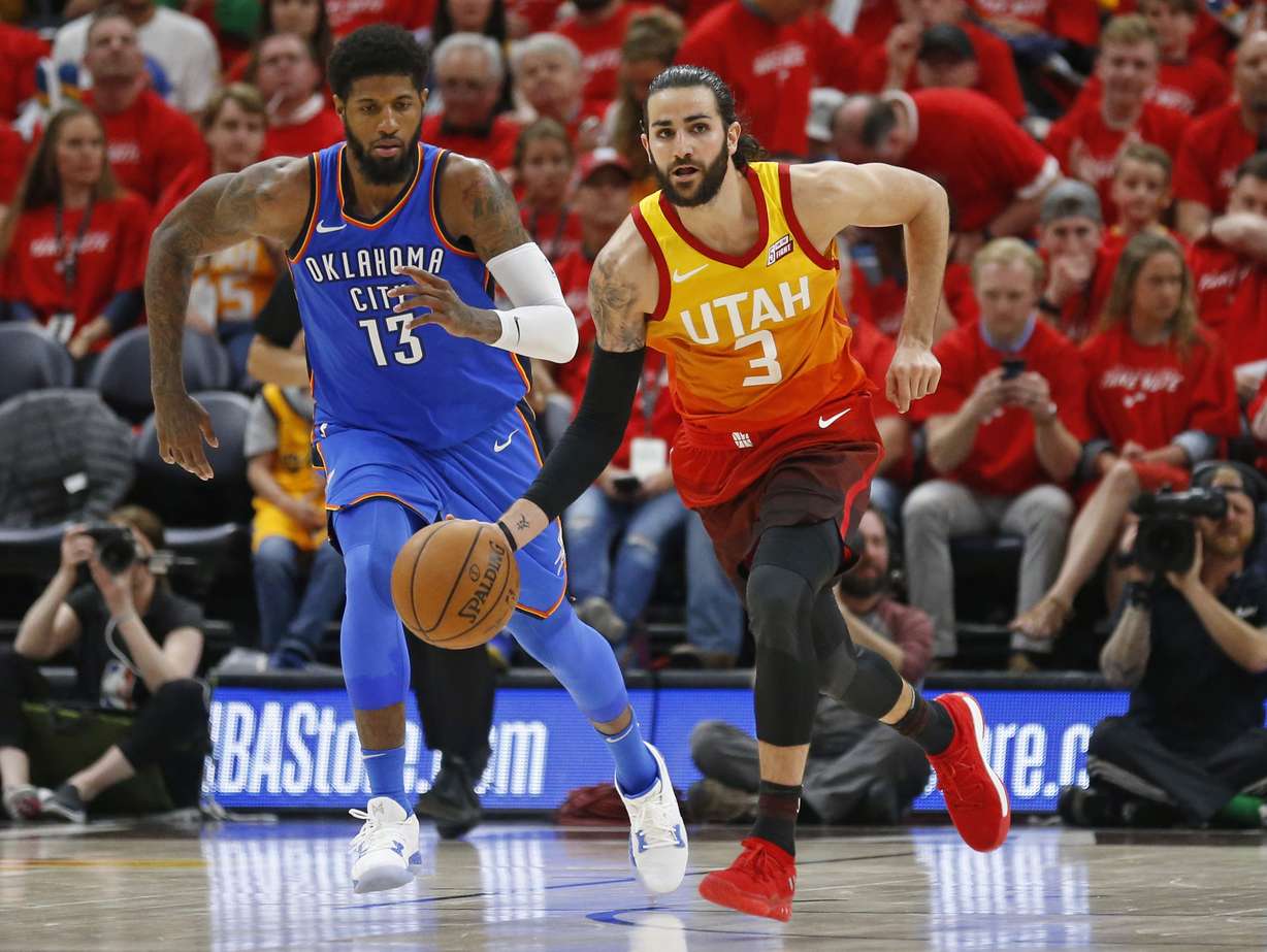 Utah Jazz guard Ricky Rubio (3) brings the ball up court as Oklahoma City Thunder forward Paul George (13) pursues in the second half during Game 3 of an NBA basketball first-round playoff series Saturday, April 21, 2018, in Salt Lake City. The Jazz won 115-102. (Photo: Rick Bowmer, AP Photo)