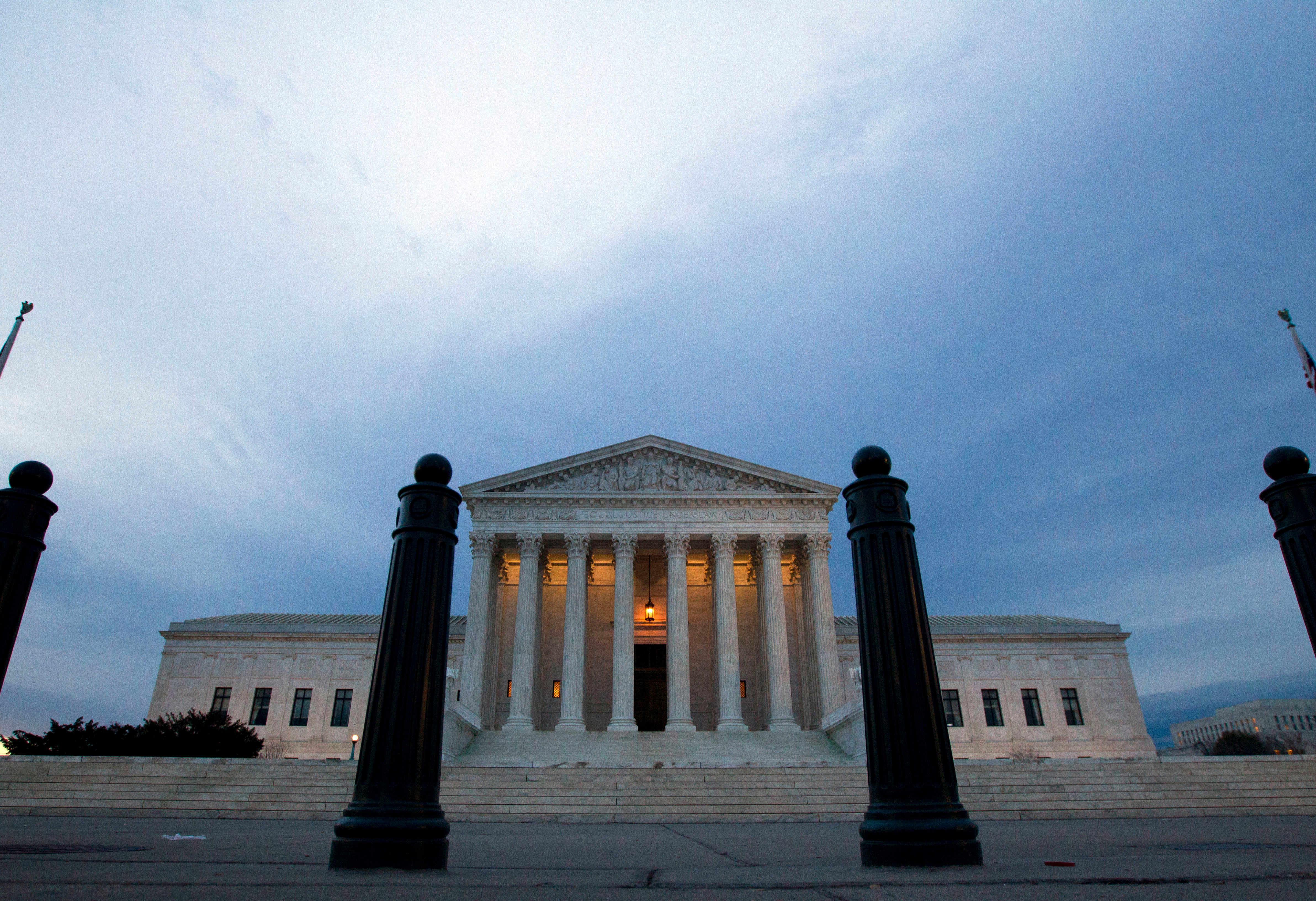 Travel ban case is justices' first dive into Trump policy