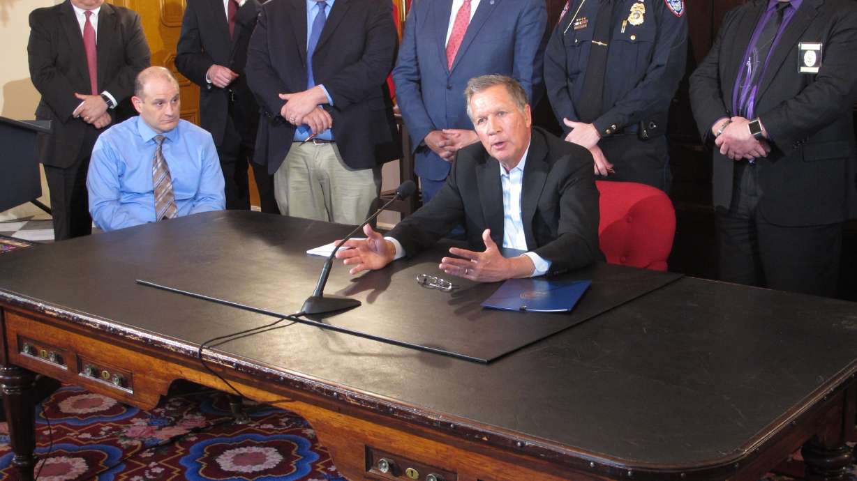 Ohio's governor signs order to tighten gun background checks