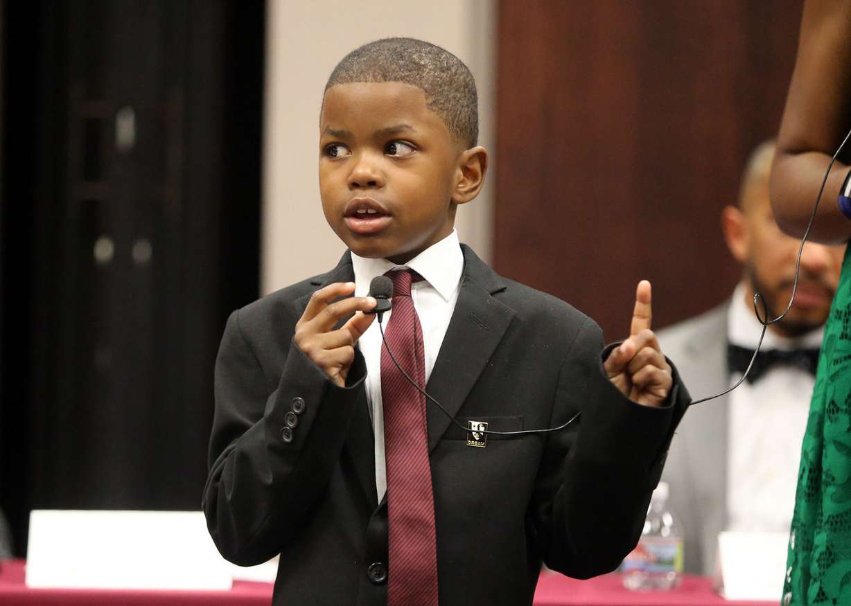 Taj Thompson tells Dr. Martin Luther King Jr.'s story "Fun Town" during a Stand Against Racism panel discussion at the Salt Lake County Government Center in Salt Lake City on Friday, April 27, 2018. (Photo: Kristin Murphy, KSL)