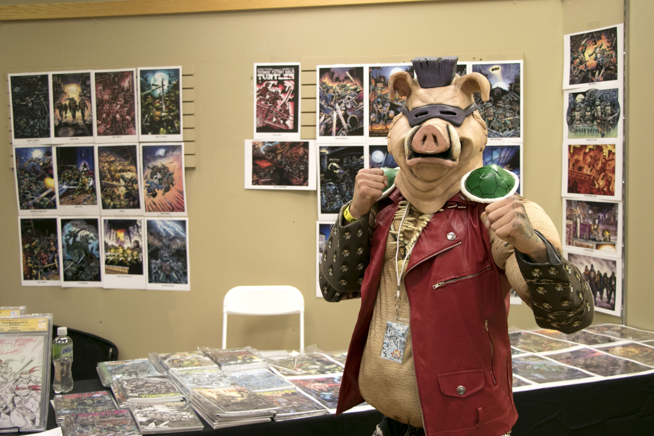 Alex Yang, of Salt Lake City, cosplayed as Bebop from "Teenage Mutant Ninja Turtles" before meeting TMNT co-creator Kevin Eastman at the Wasatch Comic Con on Friday in West Valley City. (Photo: Jacob Klopfenstein, KSL.com)