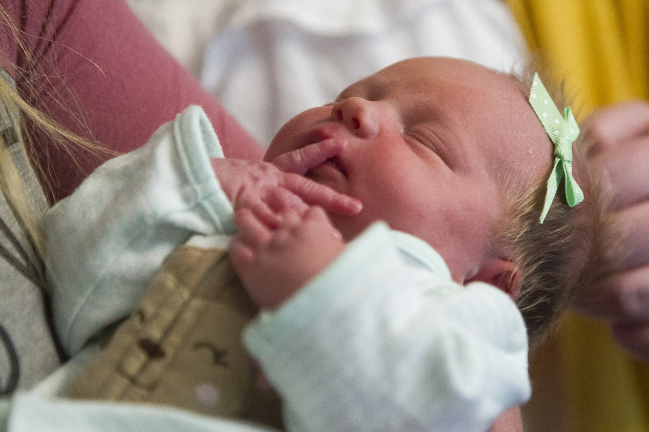 Kayla Faith Creager rests in the arms of her mother, Laura Creager, at the home of Laura's niece, Morlie Hayes, 16, in Eden on Monday, April 30, 2018. Morlie unexpectedly delivered her aunt's baby in the bathroom of her home on Saturday. (Photo: Jacob Wiegand, KSL)