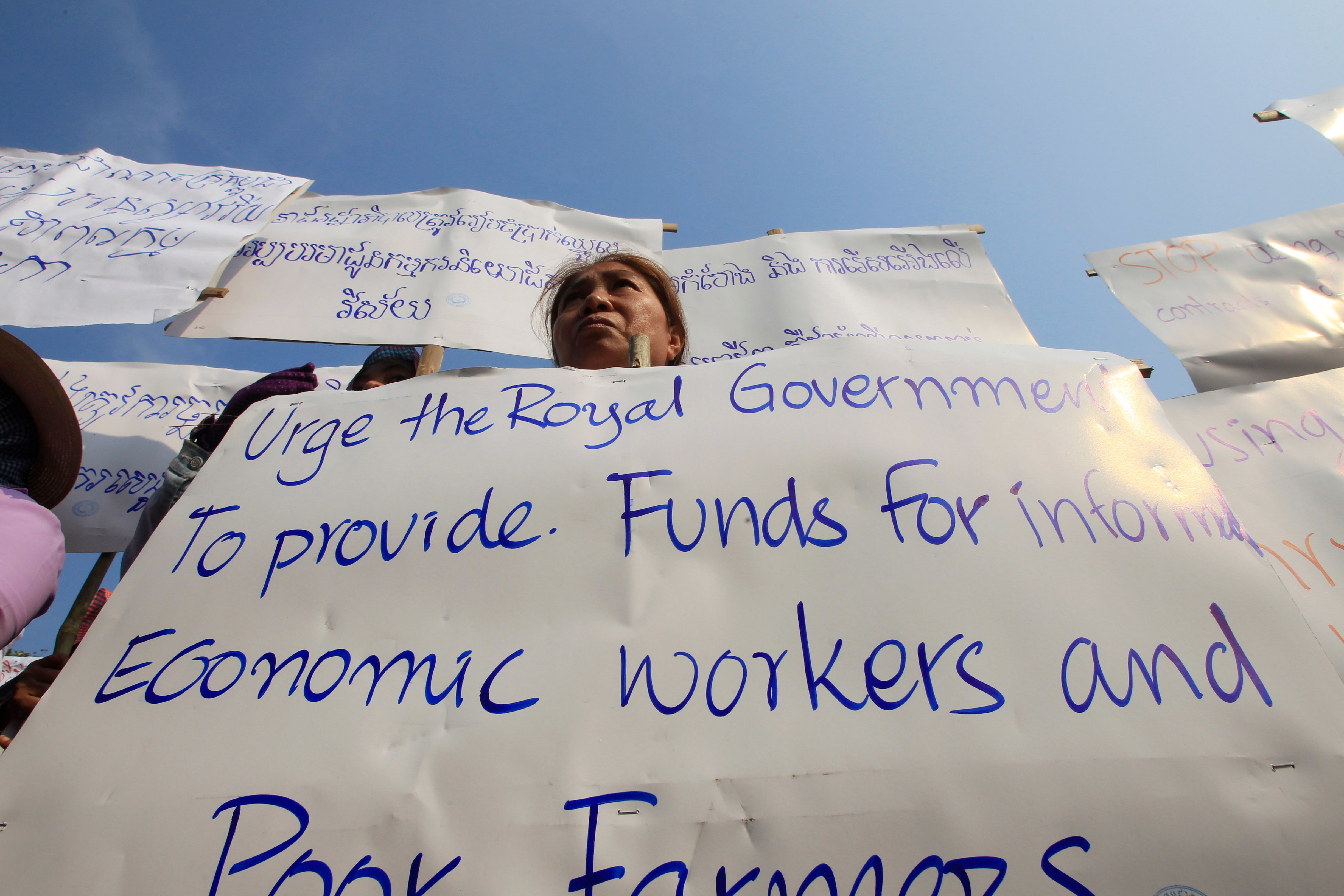 Workers, activists mark May Day with defiant rallies