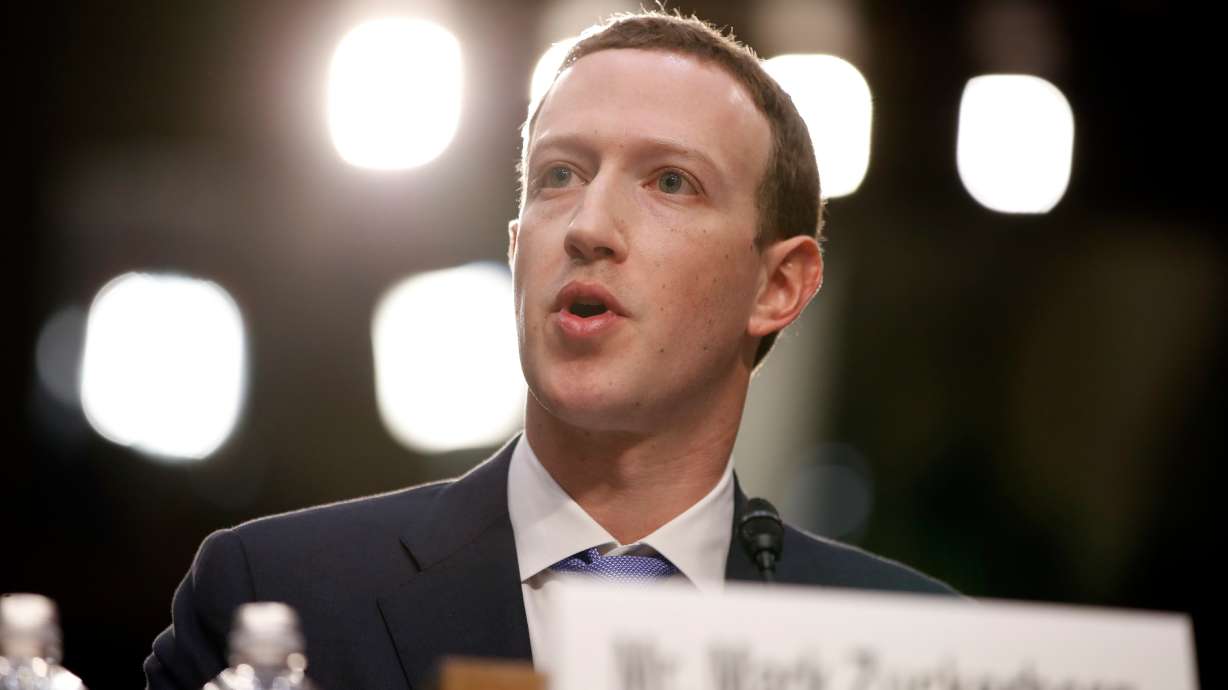 The Latest: Zuckerberg striking right tone, analysts say