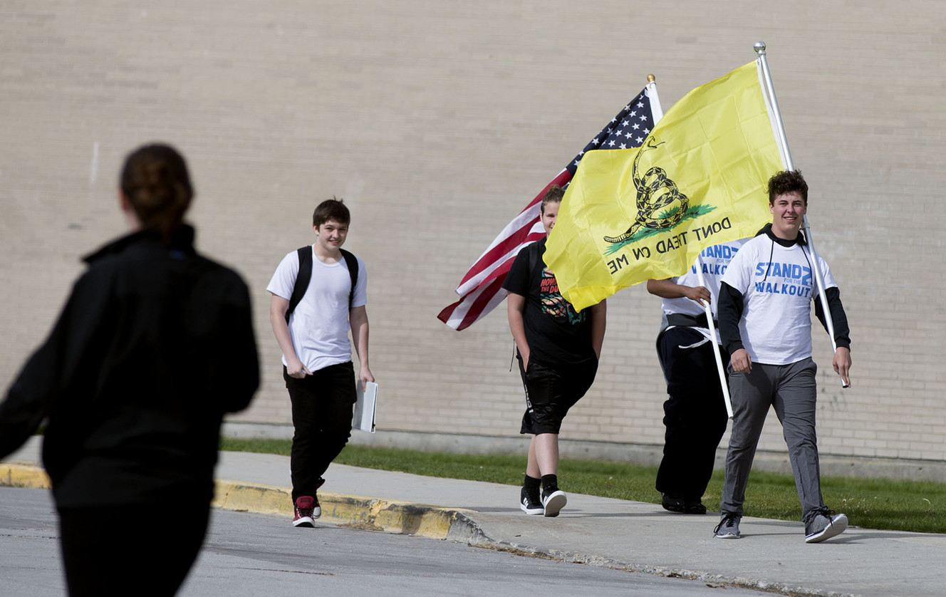 Collin Thorup, right, a 10th-grader at Hunter High School, participates in the “Stand for the Second” walkout at the West Valley school on Wednesday, May 2, 2018. Thorup, who started the group High School Kids for Guns, was one of three students in his class at Hunter High School who did not walk out with the “March for Our Lives” on March 24, which called for tighter gun control laws. (Photo: Laura Seitz, KSL)