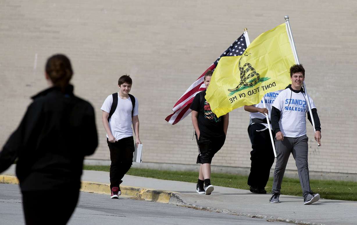 Collin Thorup, right, a 10th-grader at Hunter High School, participates in the “Stand for the Second” walkout at the West Valley school on Wednesday, May 2, 2018. Thorup, who started the group High School Kids for Guns, was one of three students in his class at Hunter High School who did not walk out with the “March for Our Lives” on March 24, which called for tighter gun control laws. (Photo: Laura Seitz, KSL)