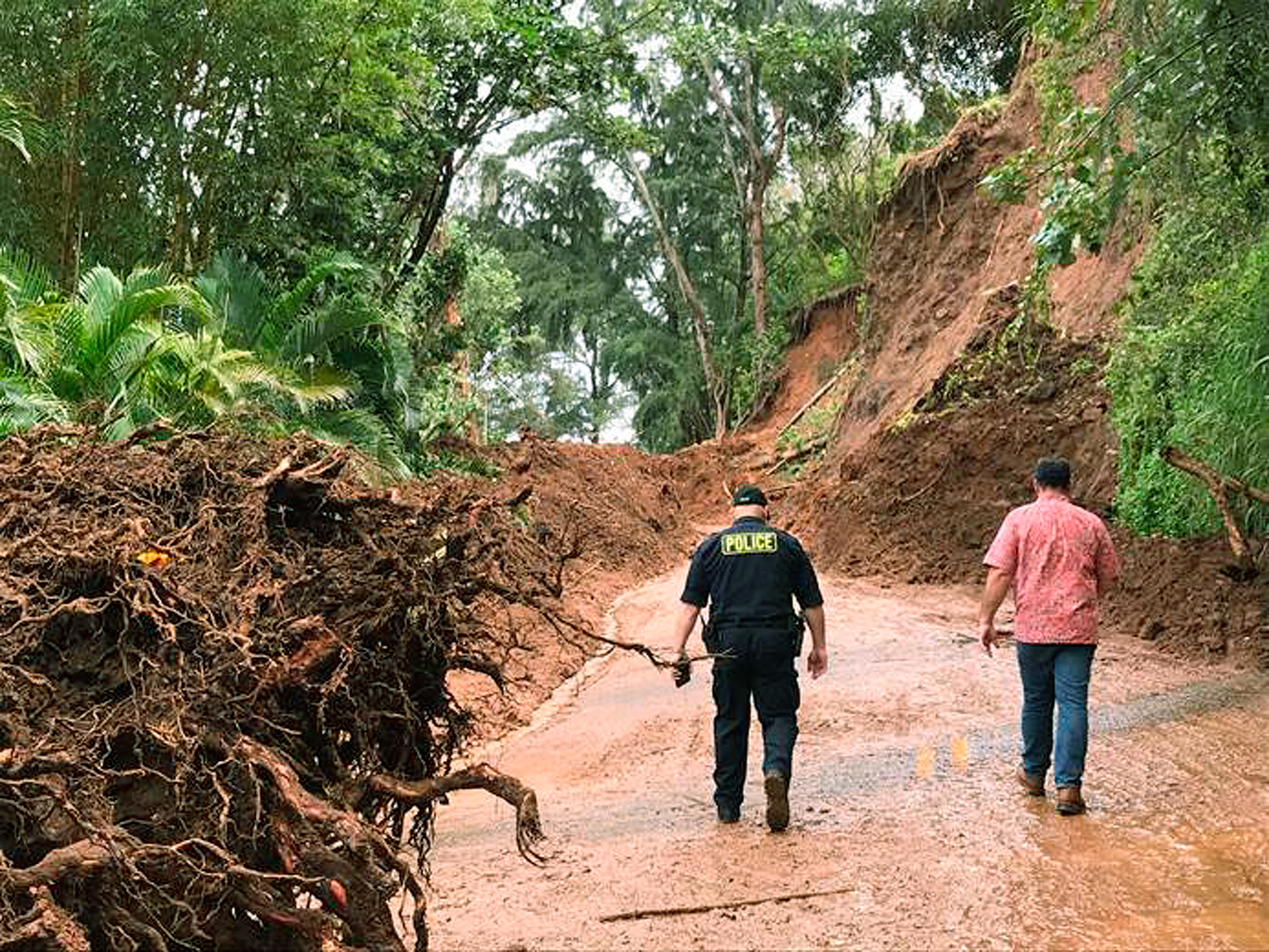 The Latest: 12 landslides fell on Kauai highway in April
