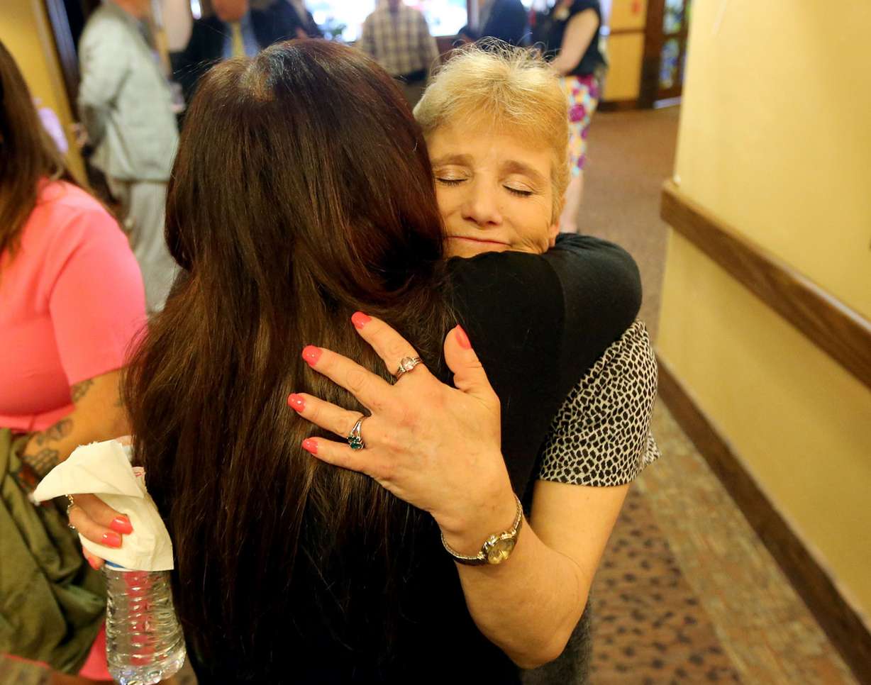 Janet Jackson, public relations volunteer for The INN Between, hugs Linda Lemieux, a resident at The INN Between who has liver disease, after a press conference at Hillside Rehabilitation Center, which will become the new The INN Between, a hospice facility for the homeless, in Salt Lake City on Thursday, May 3, 2018. (Photo: Kristin Murphy, KSL)