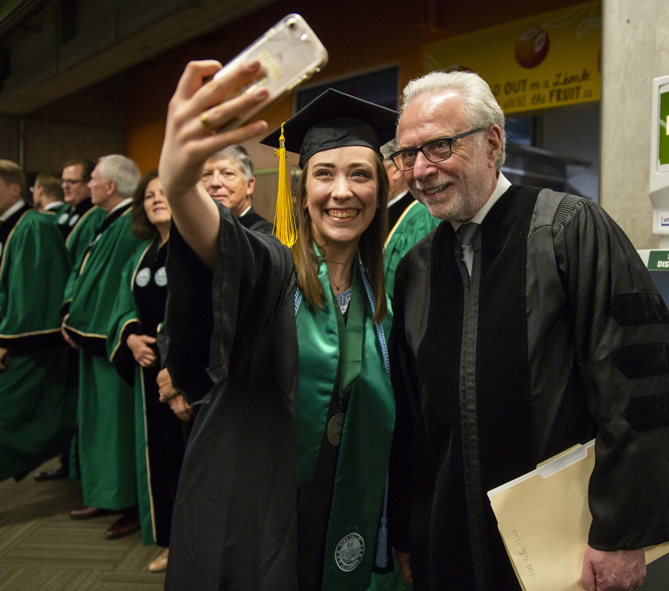 A UVU student gets a photo with Wolf Blitzer at the Utah Valley University commencement ceremony on Thursday, May 3, 2018, in Orem. (Photo: August Miller, UVU)