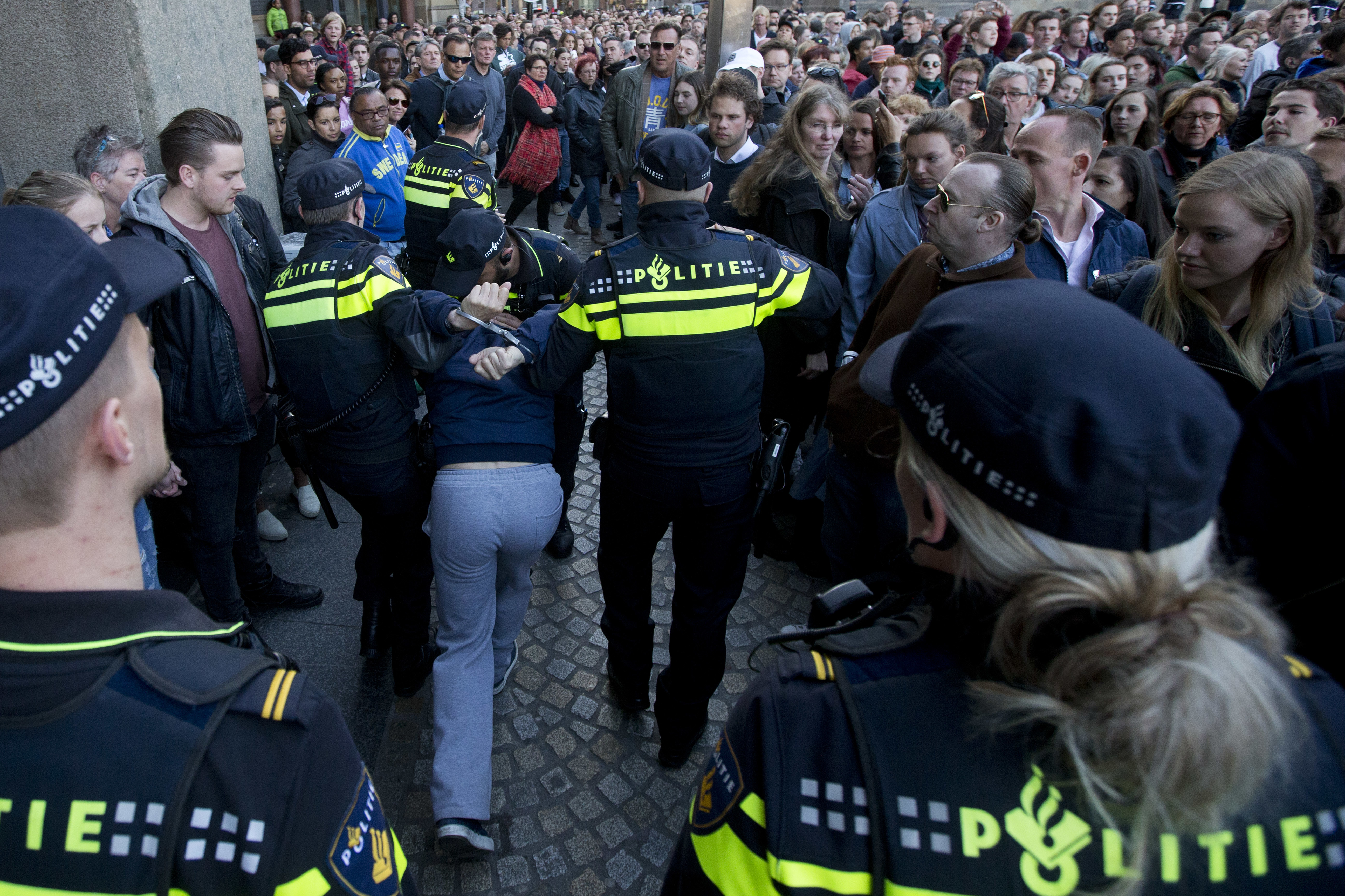 Dutch police detain man who screamed at commemoration event