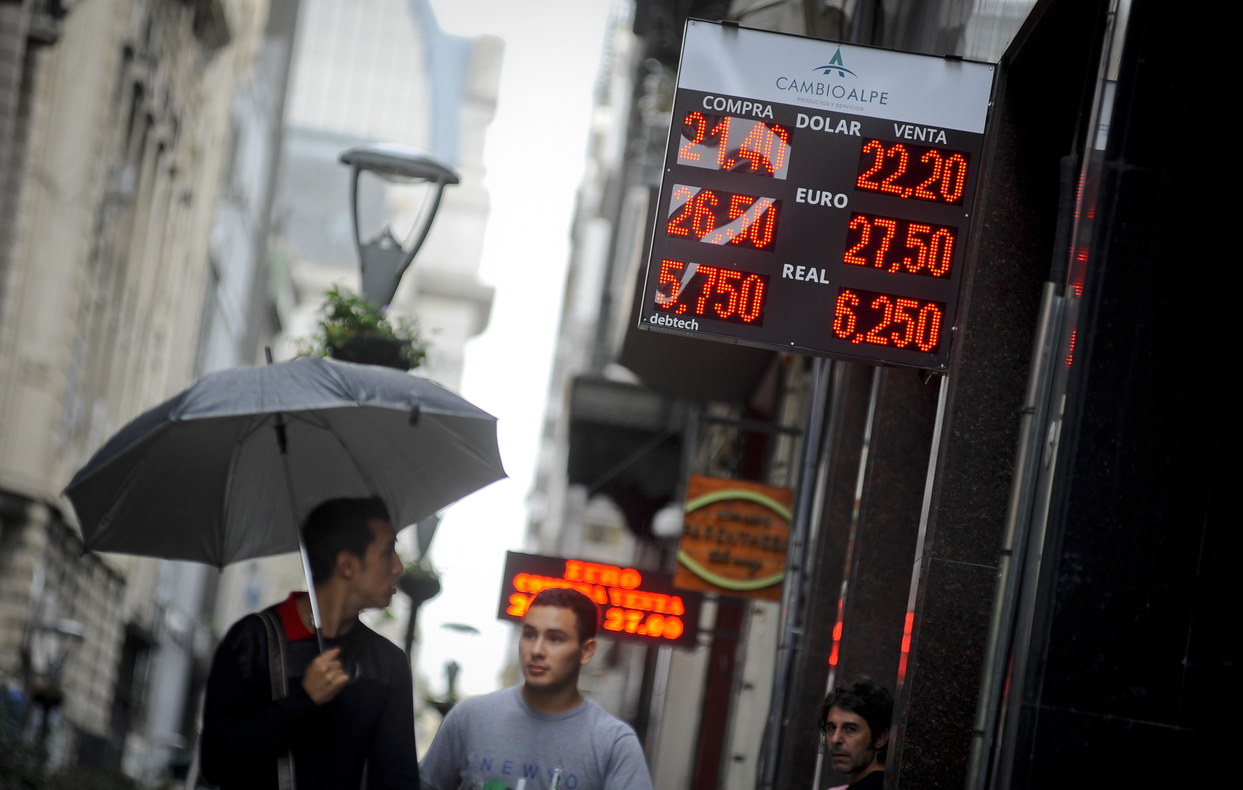 Battered Argentine peso rises after interest rate jump