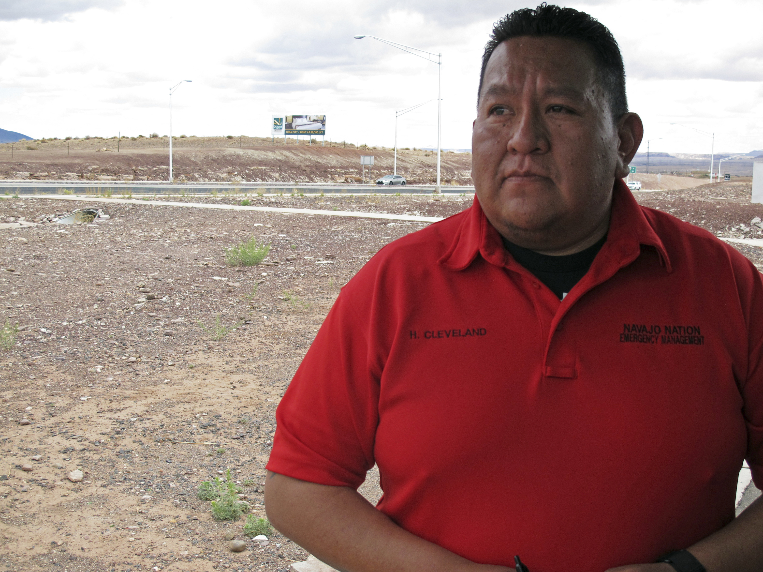 This Thursday, May 3, 2018 photo shows Harland Cleveland of the Navajo Nation Department of Emergency Management talking about efforts to bury dozens of horses that died after becoming trapped in a muddy watering hole near Cameron, Ariz. Photo: AP Photo