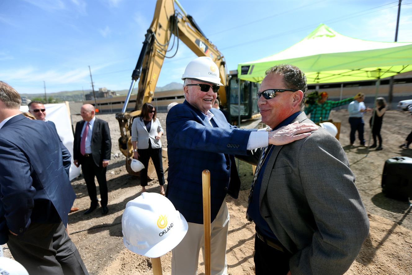 Salt Lake City businessman Pat King talks with Robert Snarr after officials broke ground for a homeless resource center at 131 E. 700 South in Salt Lake City on Monday, May 7, 2018. King donated $4 million to help build the shelter, which will be named after his mother, Geraldine. (Photo: Scott G Winterton, KSL)