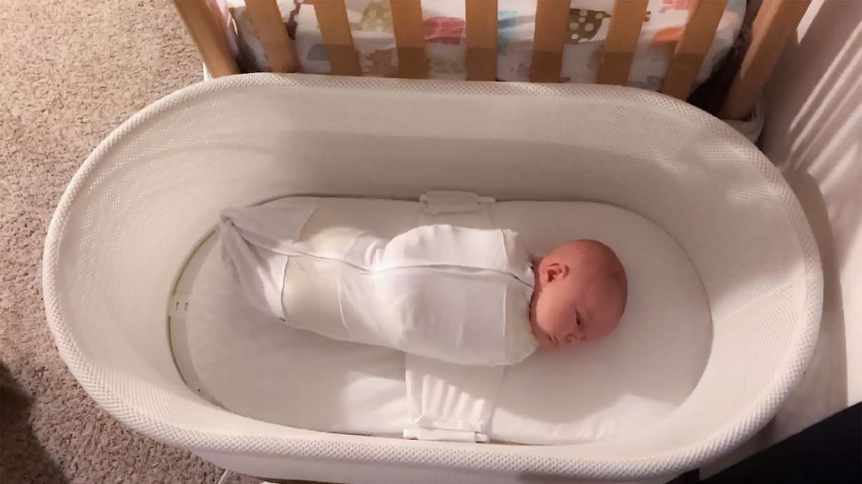 Swaddle, rock, whoosh: Putting babies to sleep in the Snoo