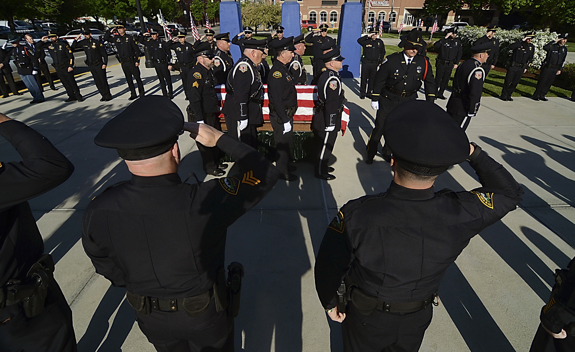 The Latest: Shootout-slain Indiana officer recalled as hero