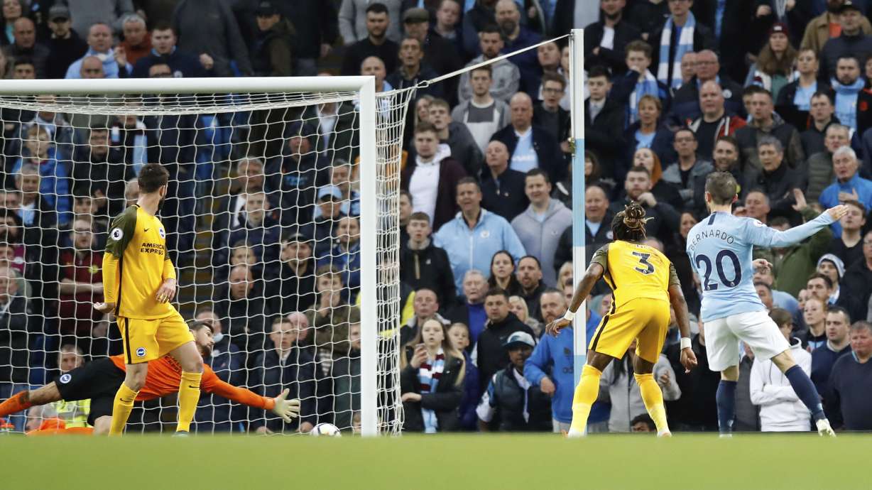 Man City sets Premier League record for points, goals, wins