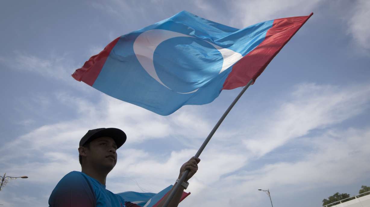 The Latest: Trump congratulates Mahathir after historic win