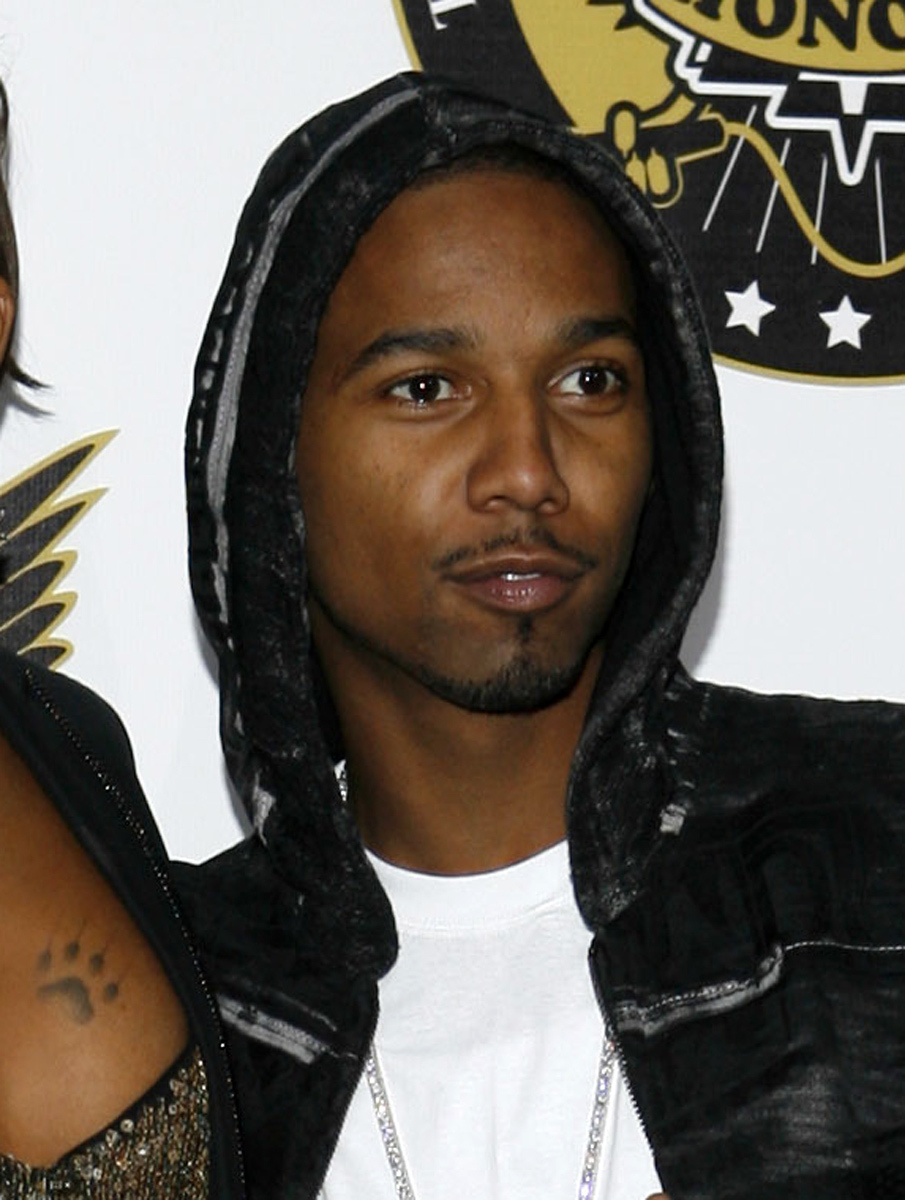 Rapper Juelz Santana pleads not guilty to airport gun charge