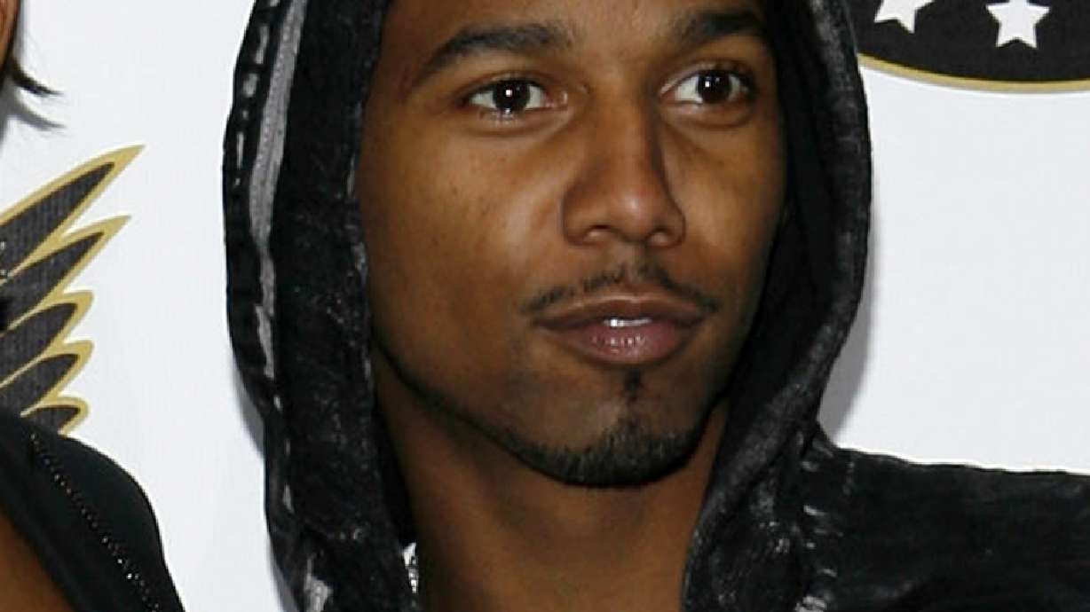 Rapper Juelz Santana pleads not guilty to airport gun charge