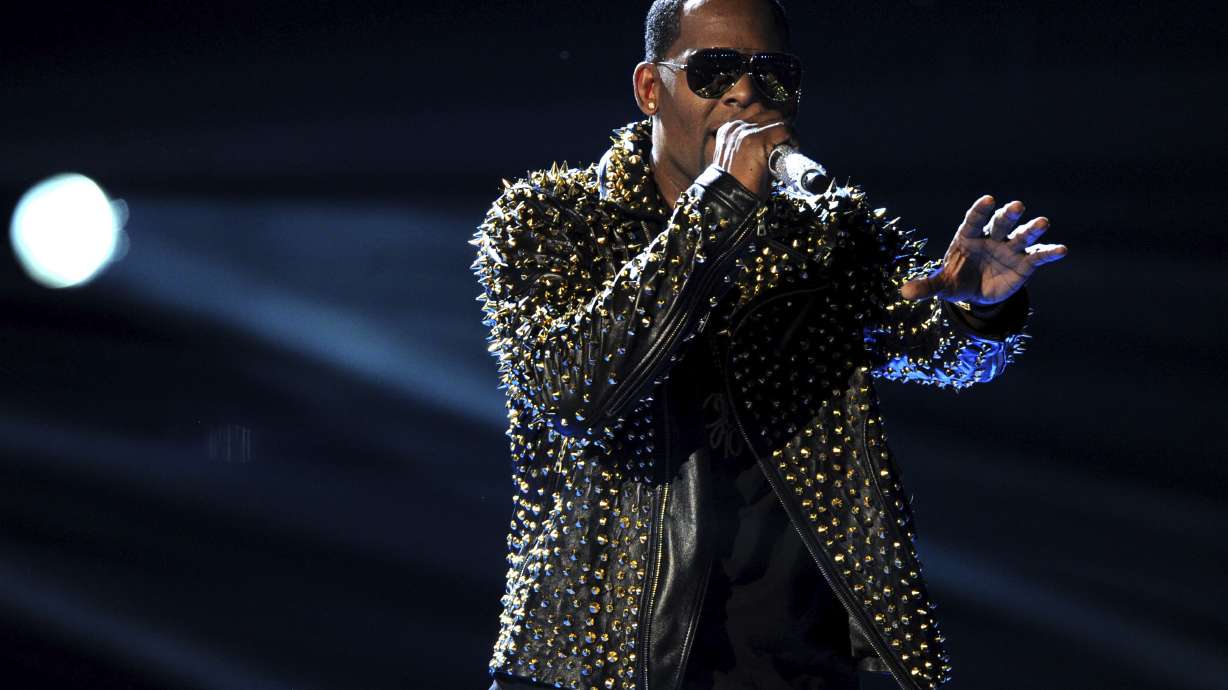 R. Kelly stages racy performance amid protest, allegations