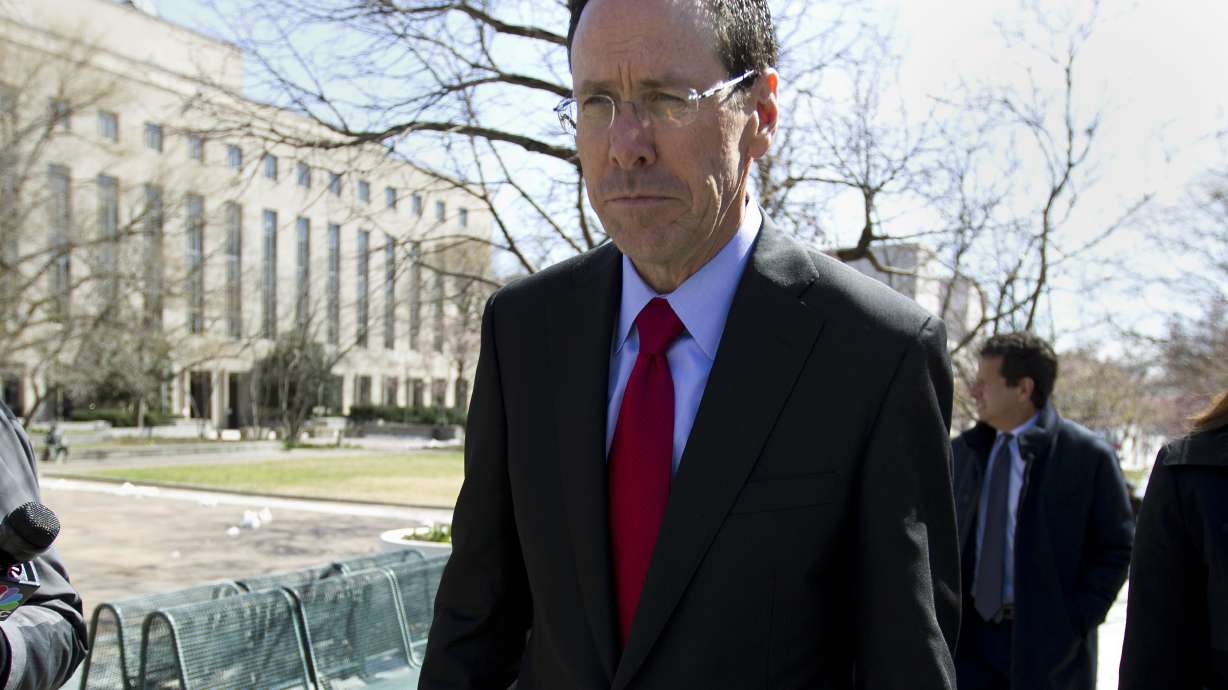 AT&T chief lobbyist out after hiring of Trump attorney Cohen