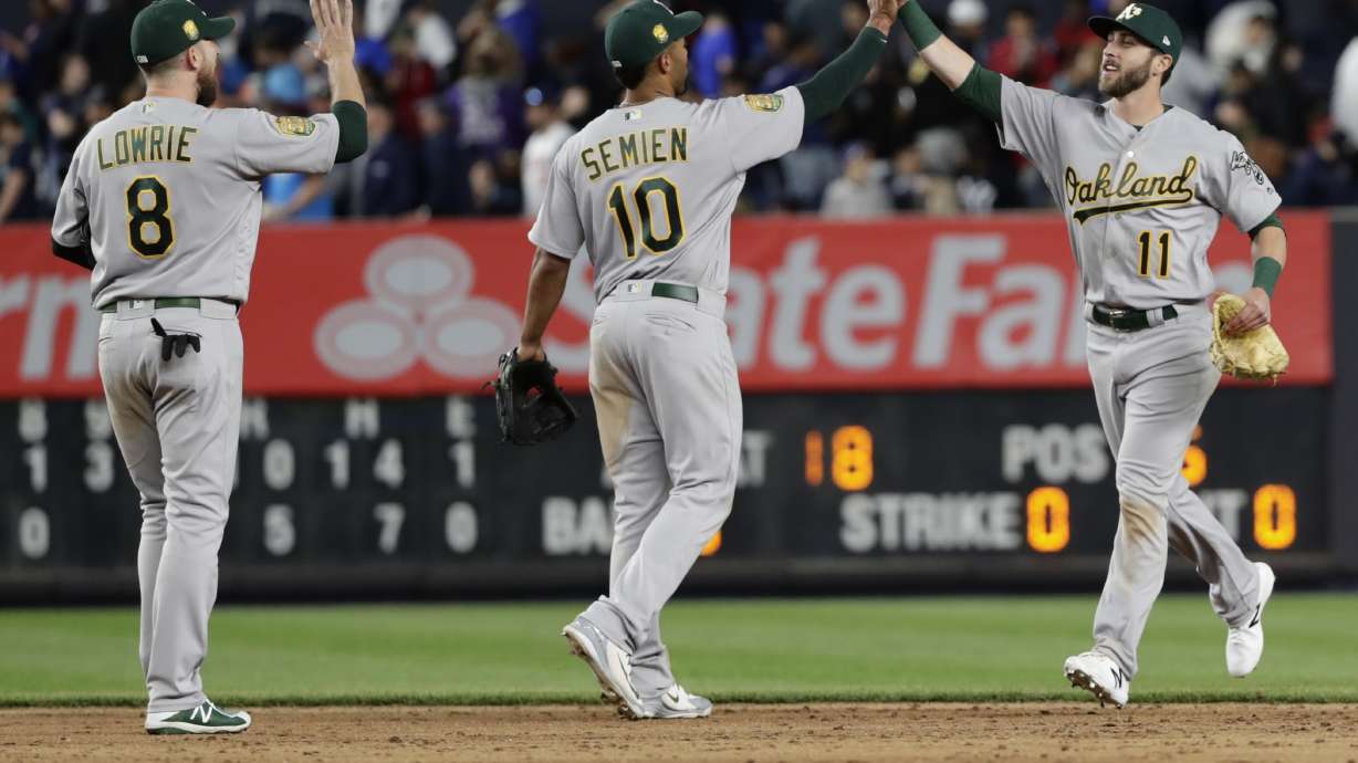 A's hit 4 HRs, rough up Gray, Yankees 10-5, end 3-game skid
