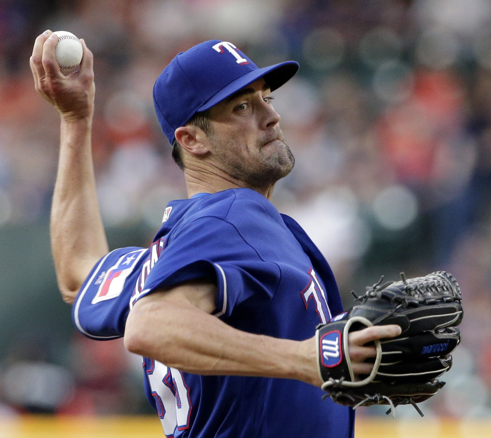Hamels shines in Rangers' 1-0 win over Astros; Springer hurt
