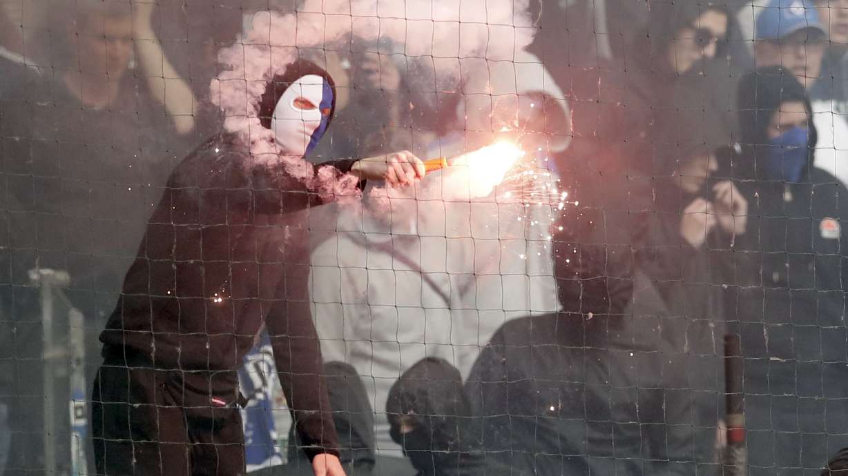 Hamburger SV relegated amid chaotic scenes in Bundesliga