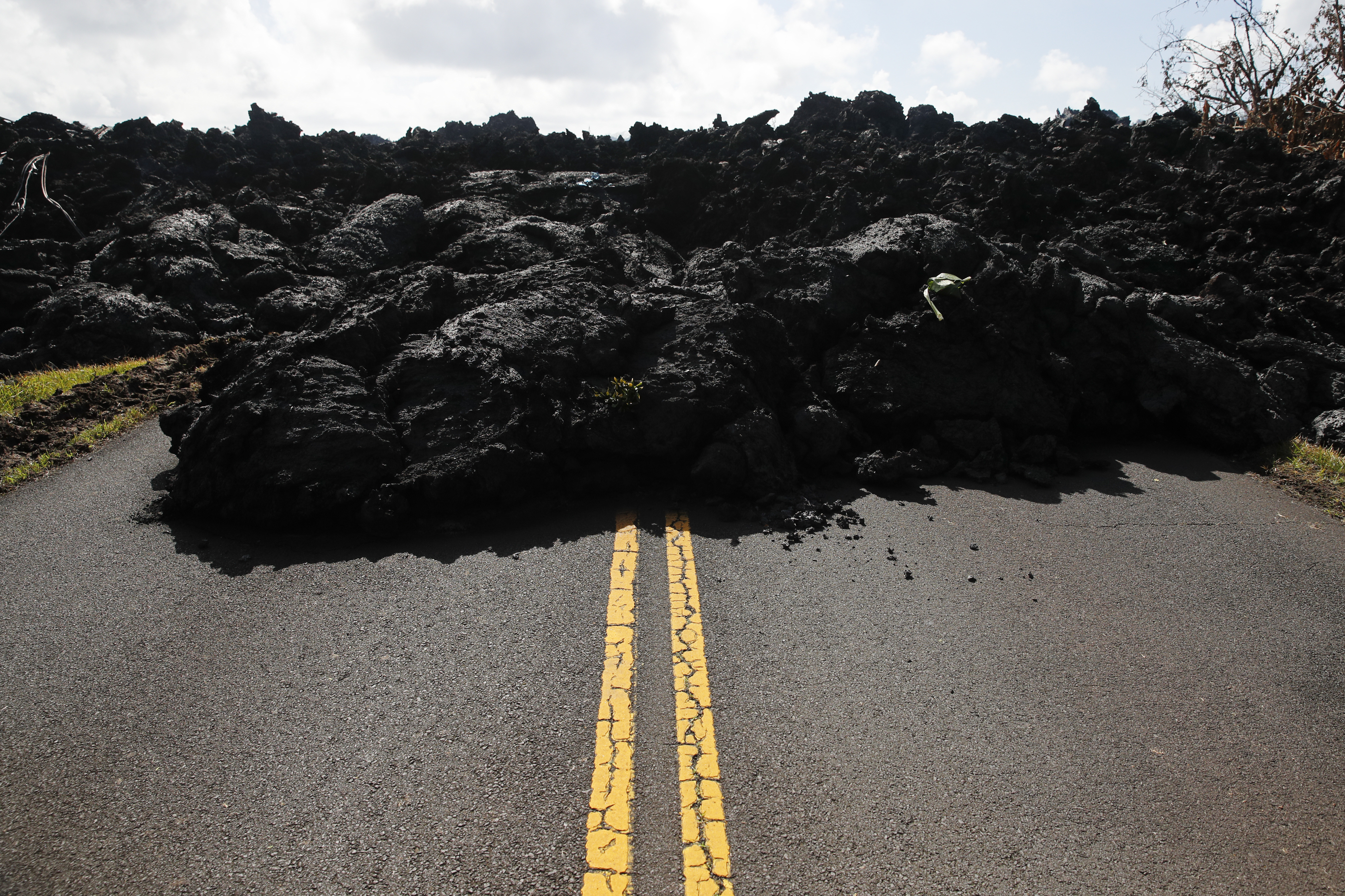 The Latest: New fissure spatters lava from Hawaii volcano