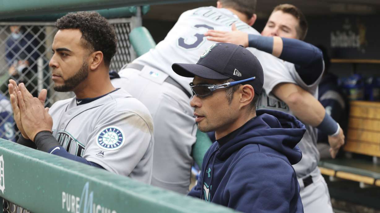 Mariners beat Tigers 9-5 for doubleheader split