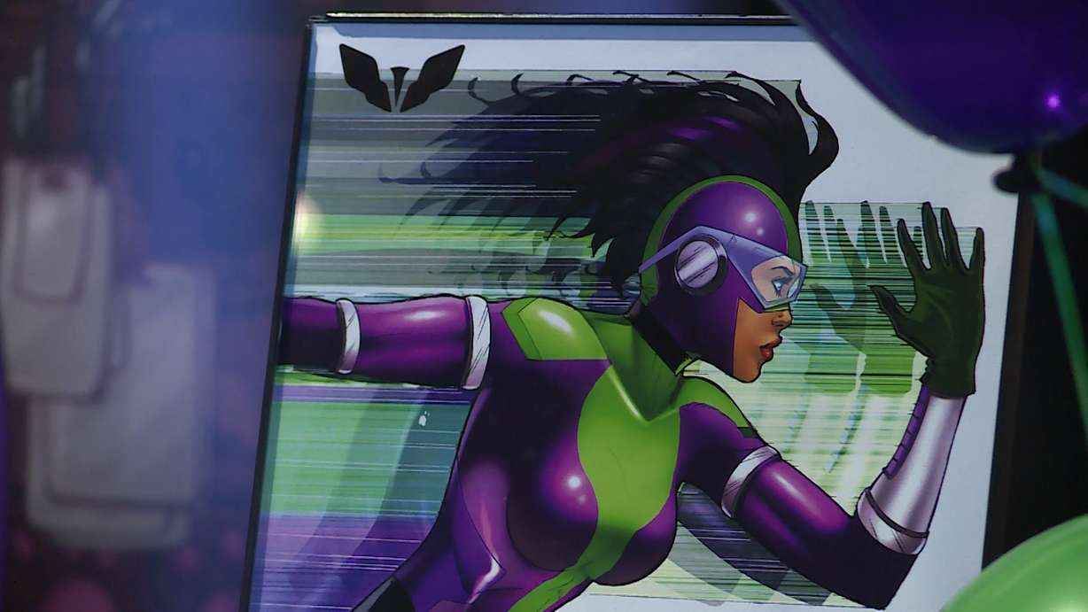 12-year-old Shelbi Webb created the comic book Sugar Glider, which is centered around a superhero with a heightened sense of empathy who helps those who are bullied. (Photo: Mike DeBernardo, KSL TV)