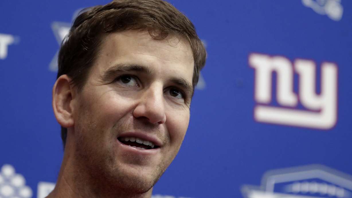 Settlement reached in Giants, Manning memorabilia fraud case