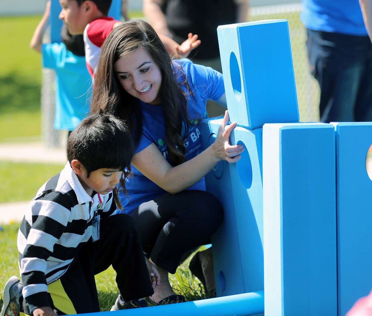 Andrea Verkic and Bryan play with a new Imagination Playground on Tuesday, May 15, 2018.(Photo: Scott G Winterton, KSL)